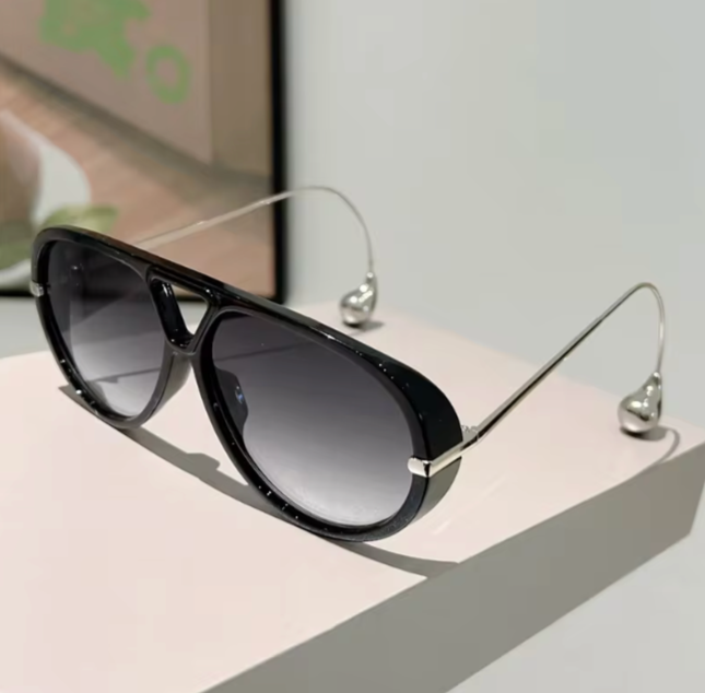 Flight Booked, Spirit Covered Sunnies